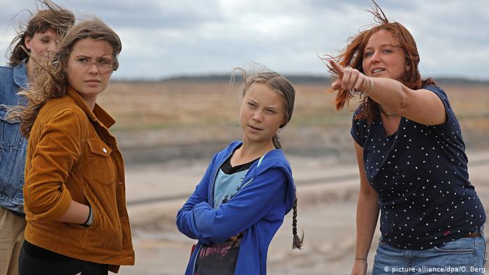 Luisa Neubauer and Greta Thunberg visit a brown coal plant in Germany